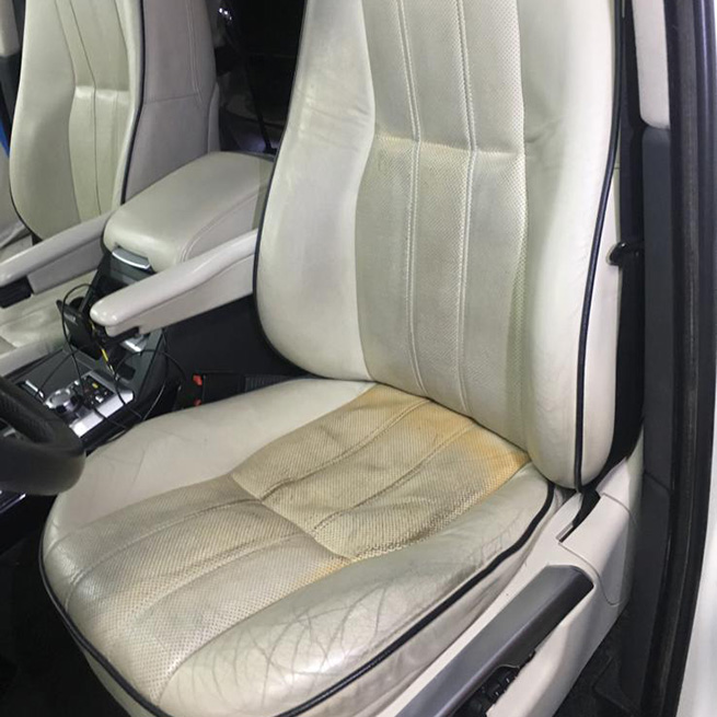 Реставрация кожи водительского сидения Range Rover - до